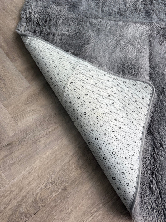 Vloerkleed grijs 200 x 140 cm