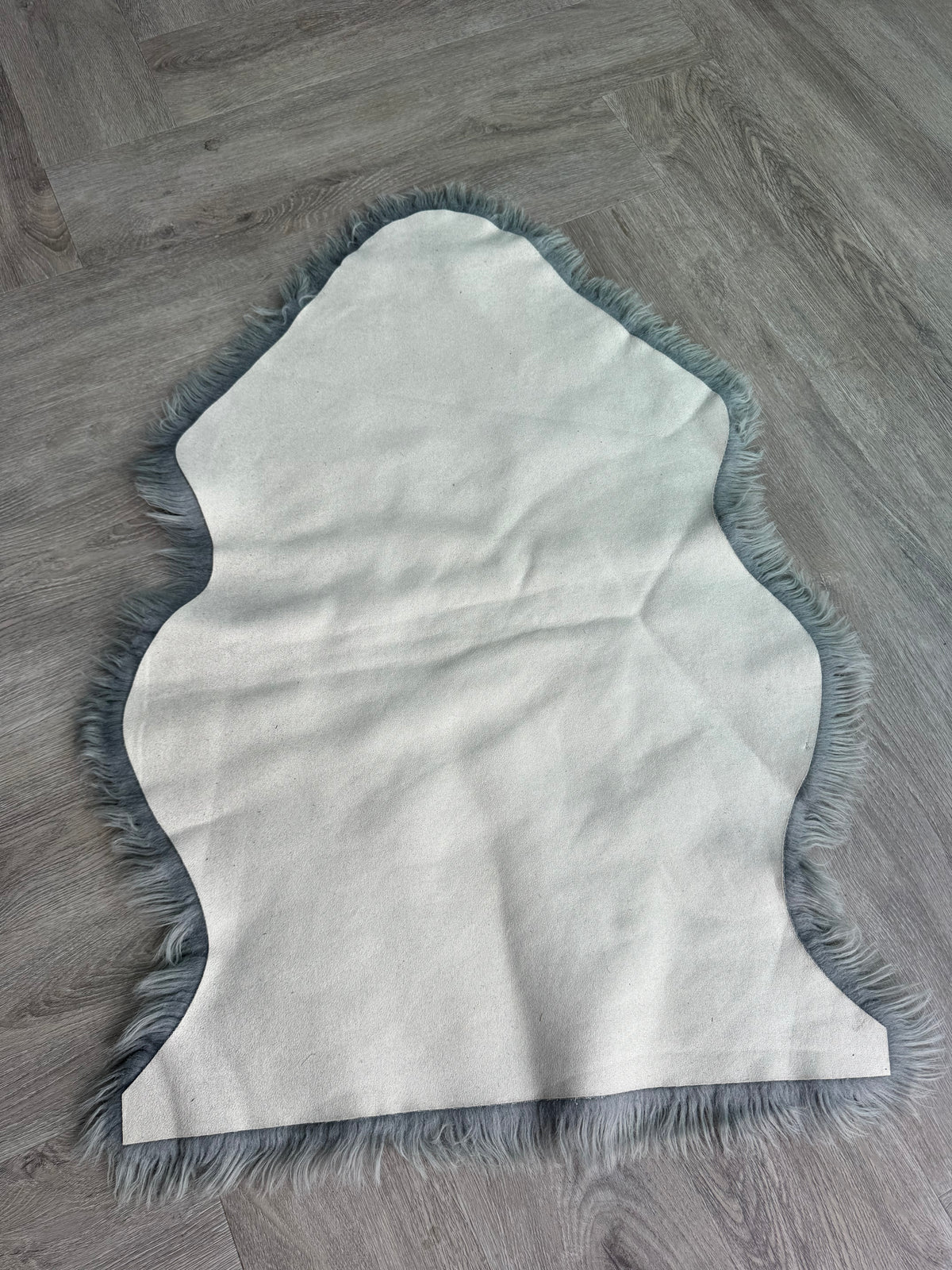 Kleedje grijs 90 x 60 cm